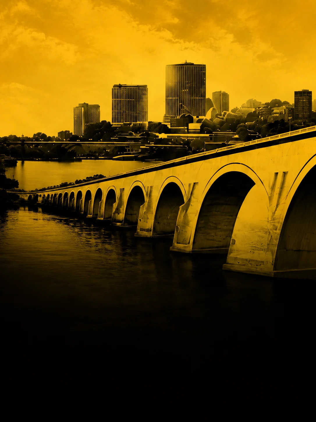 Stone Arch Bridge with the Minneapolis skyline behind it